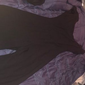Black large jumpsuit from forever 21. It has crossed back very formal and sexy.